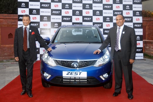 Sipradi Trading's executive chairman Siddhartha SJB Rana (L) and TATA Motors' IB-Head Johnny Oommen jointly launch ZEST, a new model of car, at Soaltee Crown Plaza on Friday.