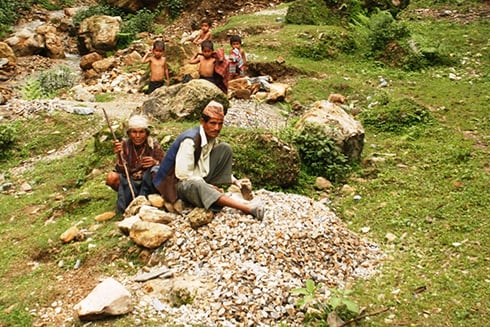 PIECE BY PIECE: This family from Bhunauli, Baitadi, makes a living turning boulders into gravel.
