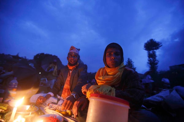 A priest performs rituals during Kuse Aunsi at Gokarneshwar temple on Monday.
