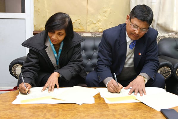 UNICEF Nepal Deputy Representative Rownak Khan, and Mahendra Prasad Shrestha, Chief of the Policy and Planning, and International Coordination Division of Ministry of Health and Population, sign a MoU for UNICEF to support the Government to build 74 disaster-resilient prefabricated health facilities in nine earthquake-affected districts on Wednesday.