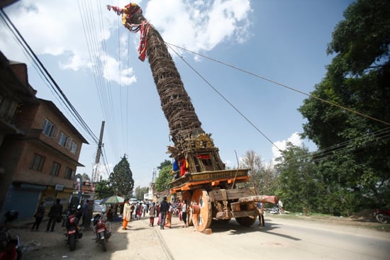The chariot of Rato Machhindranath is parked on the way to Bungamati on Saturday. The main temple was destroyed after the devastating earthquake.