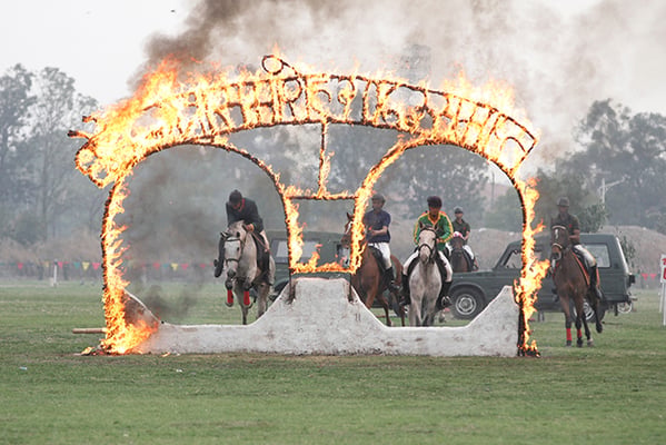 Nepal Army performs a stunt during Ghode Jatra Festival at Tundikhel on Monday.