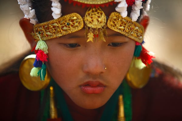 A Gurung girl dressed in traditional costume takes part in Lhosar celebrations organised in Tundhikhel on Wednesday. Members of the Gurung community in Nepal usher in the year of the monkey with a feast and various cultural programs.