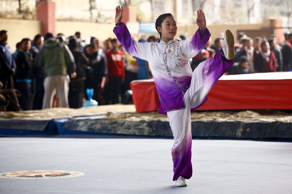 A wushu athlete participates in the selection game of the 12th South Asian Games at Dashrath Stadium on Monday.