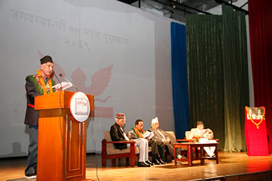 WINNERS: Poet Ratna Shumsher Thapa addresses the audience after receiving 2069 Jagadamba Shree Puraskar on Sunday. Rajan Mukarung (third from left) won this year’s Madan Puraskar for his novel Damini Bhir.