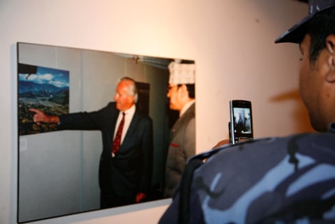 TREASURE IT: A policeman takes a photo of Toni Hagen showing Late King Birendra his palace in a photo of Kathmandu taken in 1959.
