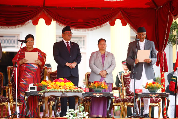 President Bidya Bhandari administers the oath of office and secrecy to new Prime Minister Sher Bahadur Deuba at Shital Niwas on Wednesday.