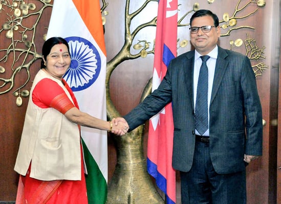 Foreign Affairs Minister Krishna Bahadur Mahara shakes hand with his Indian counterpart Sushma Swaraj in New Delhi on Monday. He is in Delhi to lay grounds for Prime Minister Sher Bahadur Deuba's India visit next week.