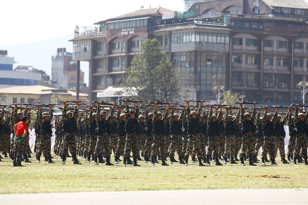 Army soldiers perform during a parade marking Army Day in Kathmandu on Monday.