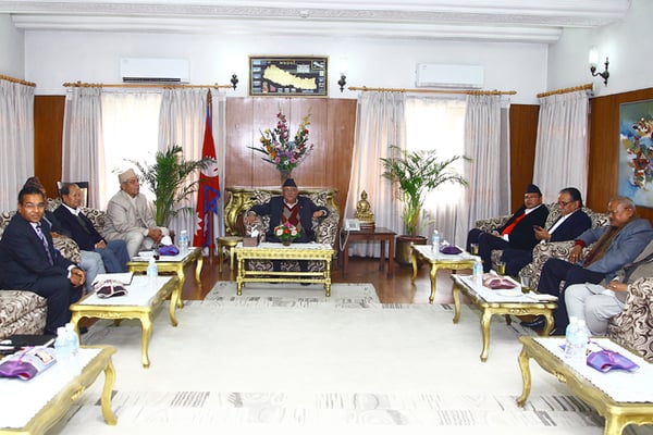 Prime Minister KP Sharma Oli briefs party leaders on his India visit at Baluwatar on Thursday.
