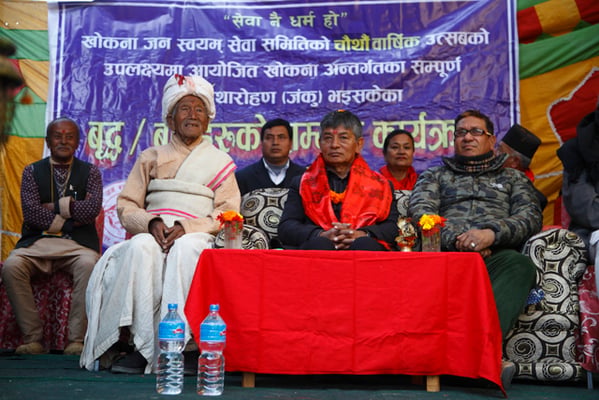 Comedians Madan Krishna Shrestha and Kiran KC attend a program to honor senior citizens in Khokana on Sunday.