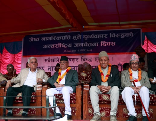(From left to right) UML leader Bharat Mohan Adhikari, Prime Minister KP Oli, scholar Satya Mohan Joshi and poet Madhav Prasad Ghimire at a program to mark the World Elder Abuse Awareness Day at Basantapur Darbar Square, Kathmandu on Wednesday.