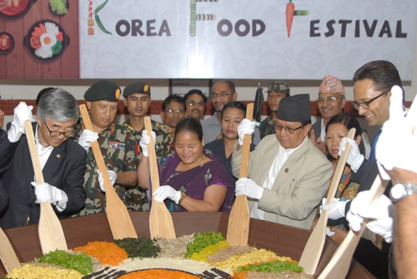 Speaker of the Parliament Onsari Gharti Magar (centre) and South Korean ambassador to Nepal Choe Yong-Jin (left) during the Korean Food Festival at Army Officer Club on Saturday.