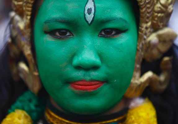 A woman dressed as a Hindu goddess takes part in a ceremony held by the government in Tundikhel, Kathmandu on Monday to welcome Nepal's Constitution 2015.