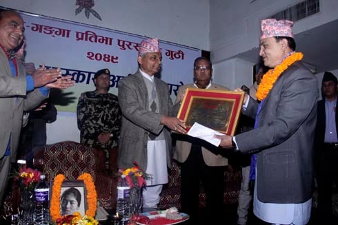MELODIOUS WIN: Folk singer Navin Kumar Khadka with this year's Noor-Ganga Folk Singing Talent Award.