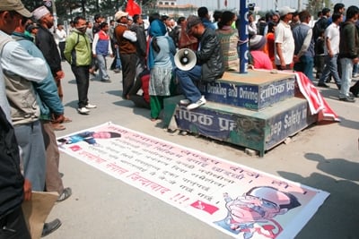 MID-DAY PROTEST: Activists gather to enforce the bandh called against the formation of CJ led election government at Baneshwor on Thursday afternoon.
