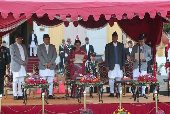 President Bidya Bhandari administers oath of office and secrecy to the new PM KP Oli at Shital Niwas on Thursday.