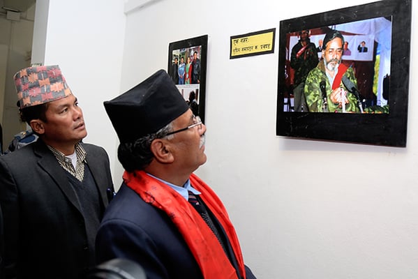 Maoist (Centre) Chair Puspa Kamal Dahal during a photo exhibition on People's War organised by Nepal Cultural Museum in Baber Mahal on Thursday. The exhibition will run for 5 days.