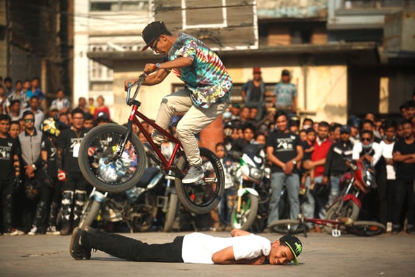 A rider performs bike stunts during the first International Bike Stunt Show in Kathmandu on Saturday.