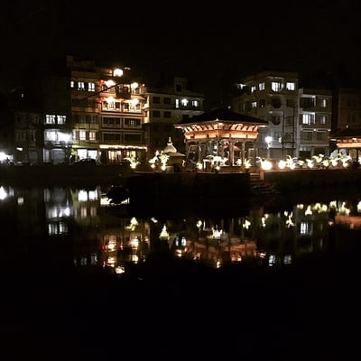The historic Pim Bahal pond in Patan that dates back 2,000 years glitters after its post-earthquake renovation on Friday evening.
