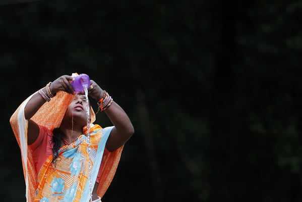 A woman takes a ritual bath on Tuesday during the first day of Godavari Mela, the month-long festival which occurs every 12 years