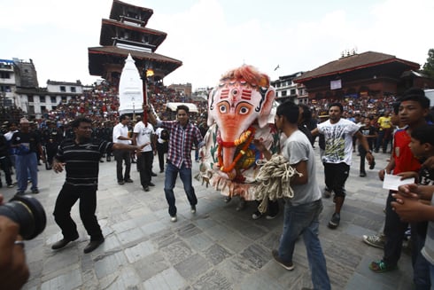 WHITE ELEPHANT: People take part in the Indra Jatra celebrations at Basantapur on Wednesday.