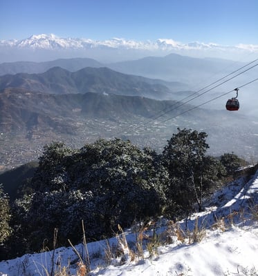 HOLI SNOW: Kathmandu residents at Chandragiri on cablecar to enjoy the snow and panorama on Phagu Purnima on Sunday.