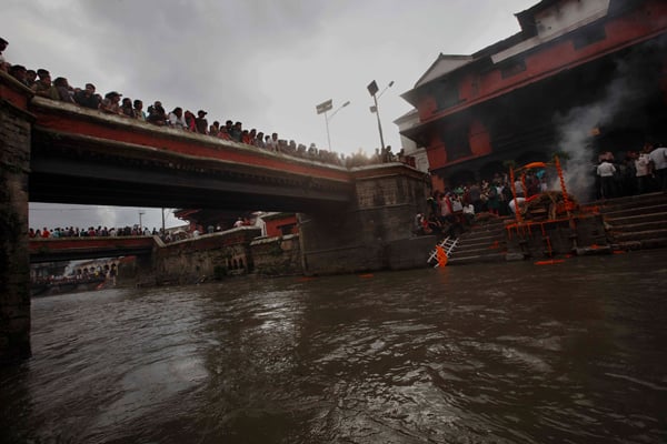 Body of SSP Laxman Neupane, killed by protesters in Kailali, has been cremated at Pashupati Aryaghat on Tuesday. Hundreds of people, including Inspector General of Police Upendra Kanta Aryal and acting Chief of Army Staff (CoAS) Rajendra Chhetri, paid final respects to Neupane before he was cremated.