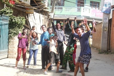 HAVING FUN: Children and adults enjoy painting their faces in bright colours and celebrate Holi in Kusunti on Tuesday.