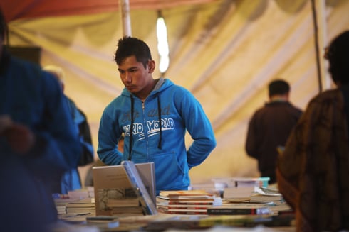 SHELF LIFE: An exhibitor at the National Book Exhibition waits for customers to buy his books at Convention Hall on Tuesday.