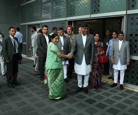 Minister of External Affairs of India Sushma Swaraj welcomes Prime Minister Sher Bahadur Deuba at Indira Gandhi International Airport in New Delhi on Wednesday.