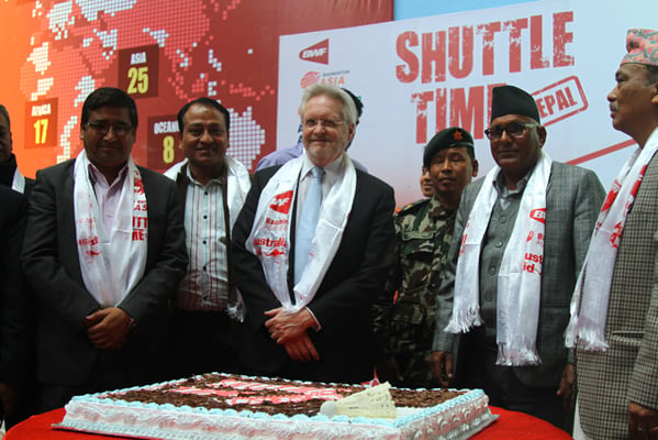 Minister of Youth and Sports Satya Narayan Mandal anmd Australian Ambassador to Nepal Glen White pose for photographs during the launch of Shuttle Time Nepal project at Dasrath Stadium, Tripureshwor on Monday.