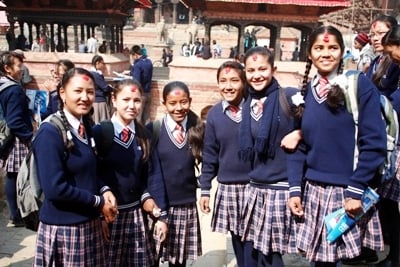 GOOD LUCK: Grade 10 girls from Aadarsha Kanya Niketan school in Mangal Bazaar give a smile before presenting their SLC examinations on Thursday.
