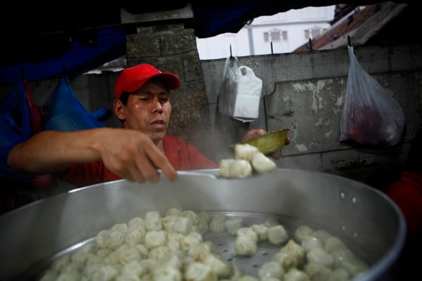 STEAMING HOT : Momo being served at a local eatery in Patan on Monday.