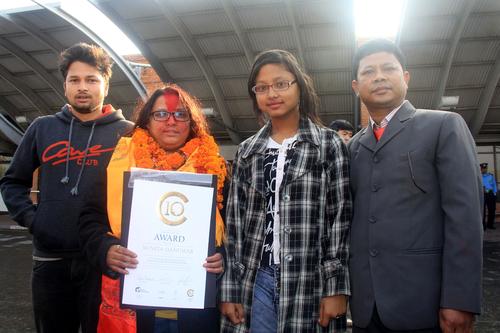 Sunita Danuwar, President of Shakti Samuha, being received at Tribhuvan International Airport on Thursday after being awarded the C10 award in Sweden.