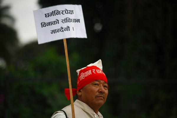 A participant in a rally organised by Indigenous People in Kathmandu on Saturday demanding a secular state.