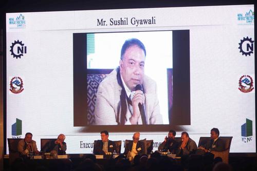 Panelist Sushil Gyawali talks to the audience during the Nepal Infrastructure Summit at Hyatt Regency on Tuesday.