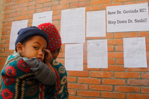 HOSPITALS ON HALT: Samjhana KC reading a notice about the closure of Teaching Hospital. Hospital services have been stopped in support of Dr. Govinda KC's hunger strike.