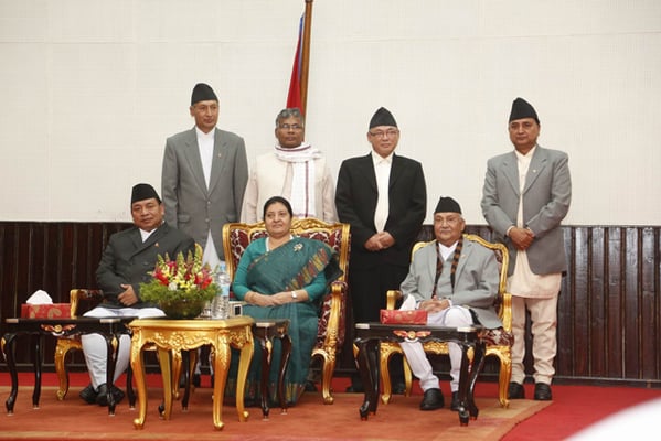 Newly inducted ministers (from left to right) Yuvaraj Khatiwada, Finance Minister, Matriaka Yadav, Minister of Commerce and Supplies, Ram Bahadur Thapa, Minister of Home Affairs and Ishwar Pokhrel, Defense Minister pose for a photo with President Bidya Bhandari, Vice President Nanda Bahadur Pun and Prime Minister KP Oli after the swearing-in ceremony in Kathmandu on Monday.
