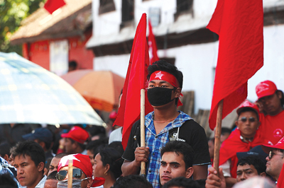 RED SEA: Cadre of CPN-M participate in a rally at New Road on Wednesday afternoon to mark International Labour day.