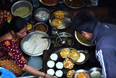 PALATE PALETTE: Kitchen staff at Honacha, a popular eatery in Patan Darbar Square, tend to their customers’ orders on Monday.
