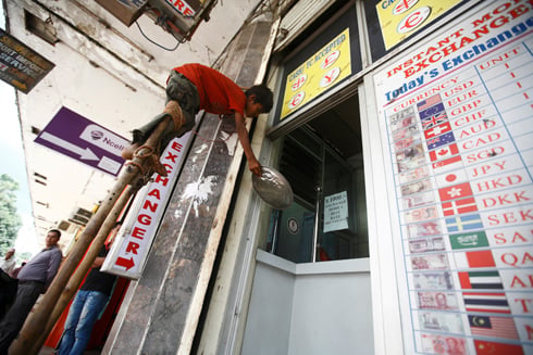 HERE I AM: Eleven year old street performer Ashish Tharu collecting money at Thamel on Tuesday.