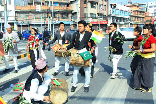 A group of performers prepare to welcome the Heads of States ahead of the SAARC Summit at Tripureshwor on Tuesday.