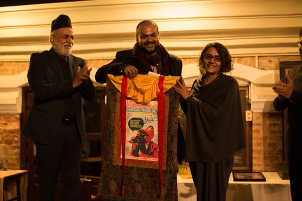 Chief Guest of Film Southasia, Sashi Kumar present the Ram Bahadur Award for Best Film to Directors of "Soz – A Ballad of Maladies", Tushar Madhav and Sarvnik Kaur during the closing ceremony on Sunday. Soz shared the award with "Demons in Paradise" directed by Jude Ratnam.