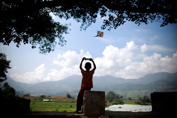 A boy flies a kite in Lalitpur on Sunday. Flying kites is a favourite leisure time activity among youngsters during the Dasain festival.