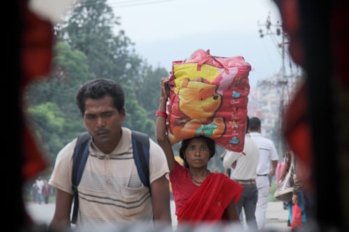 People walk to their destination during a general strike called by CPN Maoist (Netra Bikram Chanda) on Friday.