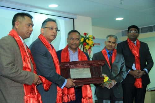 Kumud Dhital (second, left), the world's first surgeon to perform a dead heart transplant, being felicitated at the Grande International Hospital on Monday.