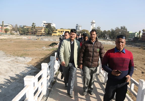 Kathmandu Metropolitan City Mayor Bidya Sundar Shakya visits Rani Pokhari on Tuesday. He opened the padlock put in the morning by locals and heritage conservationists protesting the use of concrete in the reconstruction of Rani Pokhari.