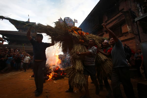 Locals in Bhaktapur carry an effigy of Ghantakarna, a mythical demon during the Gathamuga festival on Friday. The effigy made of straw and wood is burned to symbolise destruction of evil.