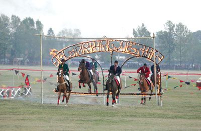 HORSES FOR COURSES: Horses perform the fire jump to mark the end of Ghode Jatra program at Tudikhel on Wednesday afternoon.